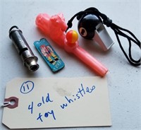 4 old toy whistles cowboy lion 8 ball etc
