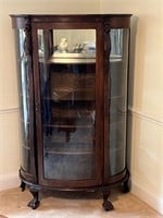 Circa 1850 Bow cabinet front lions feet & head