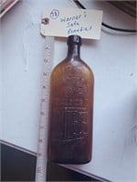Warner's Safe Remedies bottle w embossed figural