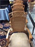 Set of four wicker and iron chairs