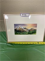 Framed Mountain scenery art by J. Findlay. 14" x