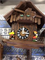 Cuckoo clock with man and woman