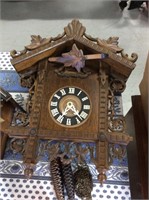 Large brown carved cuckoo clock