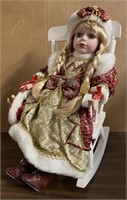 CHRISTMAS DOLL IN CHAIR