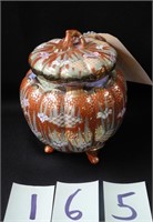 Early Covered Oriental Footed Jar