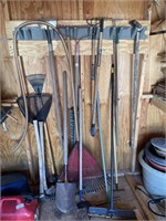 WALL OF HAND TOOLS AND POLE SAW