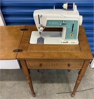 VINTAGE SINGER SEWING MACHINE AND CABINET