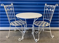 CHILDRENS WHITE IRON TABLE AND CHAIRS
