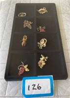 Pins including an Enameled Bull Fight Pin
