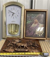 2 clocks and a moose hanging plaque