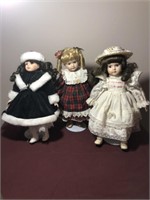 4 Assorted Dolls