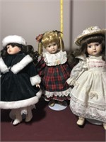 4 Assorted Dolls