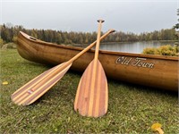 Very nice wooden handmade canoe decorated with bra