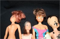 7 Plastic Barbie-Like Dolls (2 small figures
