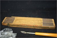 Folding wooden ruler; measuring tape; eraser