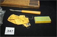 Folding wooden ruler; measuring tape; eraser