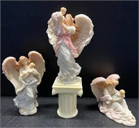 3 SERAPHIM ANGELS HOLDING BABIES AND PEDESTAL