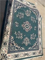 2 +\- Rugs. Blue Rug Approx 8’x10’. Green Approx