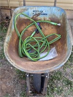 Wheel barrow, garden hose