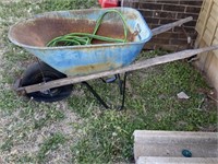 Wheel barrow, garden hose