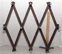 Expanding hat/coat rack with porcelain buttons