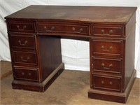 Mahogany kneehole desk, finish in fair condition