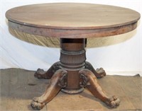 Round oak pedestal ext. table, claw feet, 48" dia.