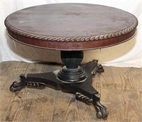 round mahogany cocktail height table with fancy