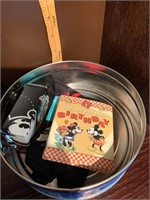Disney tin of keepsakes with Mickey socks