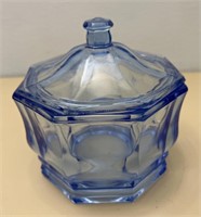 Blue candy dish has small chip in the lid