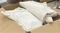 large assortment of table clothes and napkins