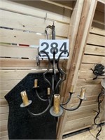 Wrought iron lighted hanging candles