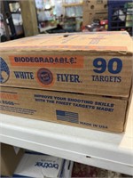 Unopened case of white flyer clay pigeons