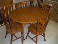 Laminate table & 4 wood chairs  36x36/48x30