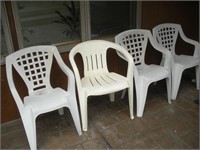 (4) Plastic patio chairs