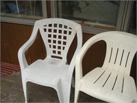 (4) Plastic patio chairs