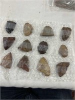 12 ancient arrowheads and worked stone