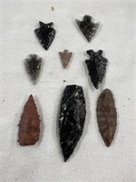 Eight arrowheads, mostly obsidian. Very nice bird