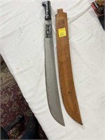 Machete by Collins Company in tooled leather