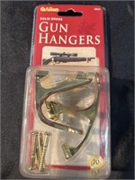 Solid brass gun hangers new in the box