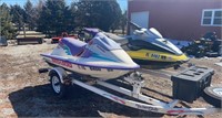 2 Bombardier seadoo's with trailer