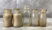 (5) vintage glass bottles,& milk jars half pint