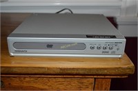 Magnavox DVD Player and DVD's (contents of bottom