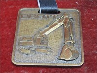 Old construction pocket watch fob. Advertising.