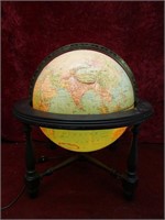 Vintage lighted replogle world globe.