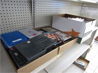 DVDs, plastic cases, VHS cassettes.