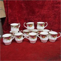 (12)Old c country roses Royal Albert cups.