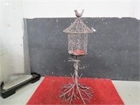 Birdhouse décor candle holder.