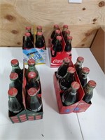 3 6 Pack of Coke and 1 4 Pack of Coke