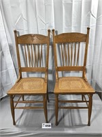 2 OAK CHAIRS WITH WICKER BOTTOMS